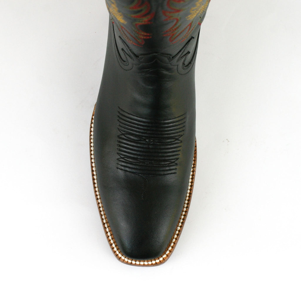 Russell cowboy boots toe view with white background