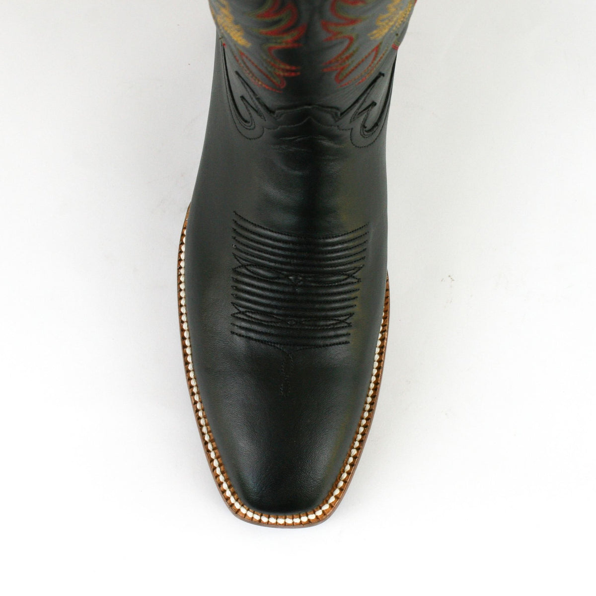 Russell cowboy boots toe view with white background